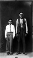 http://www.bernalespacio.com/files/gimgs/th-47_MikeDisfarmer From the Heber Springs Portraits (man and boy with arms at sides) 1940s.jpg